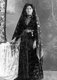 Middle East / Causcasus: Adyghe or Circassian woman in traditional dress, c. 1920