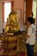 Thailand: A copy of the Phra Thong temple's famous half buried Buddha figure for people to press gold leaf onto, Wat Phra Thong, Phuket